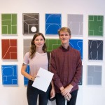 Matthew Feyld and his lovely partner Lucy in front of Matthew's White Out series