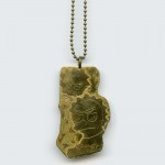 Simpsons Brass Necklace II by Christopher Benjamin Speck.